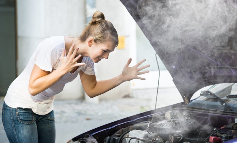 10 Car Engine Problems: Warning Signs You Shouldn’t Ignore 1 Frustrated Lady facing Car Engine Problems